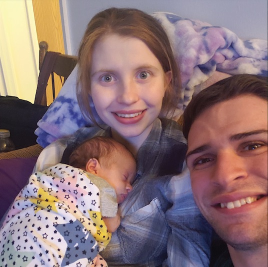 Mayer with his wife and child