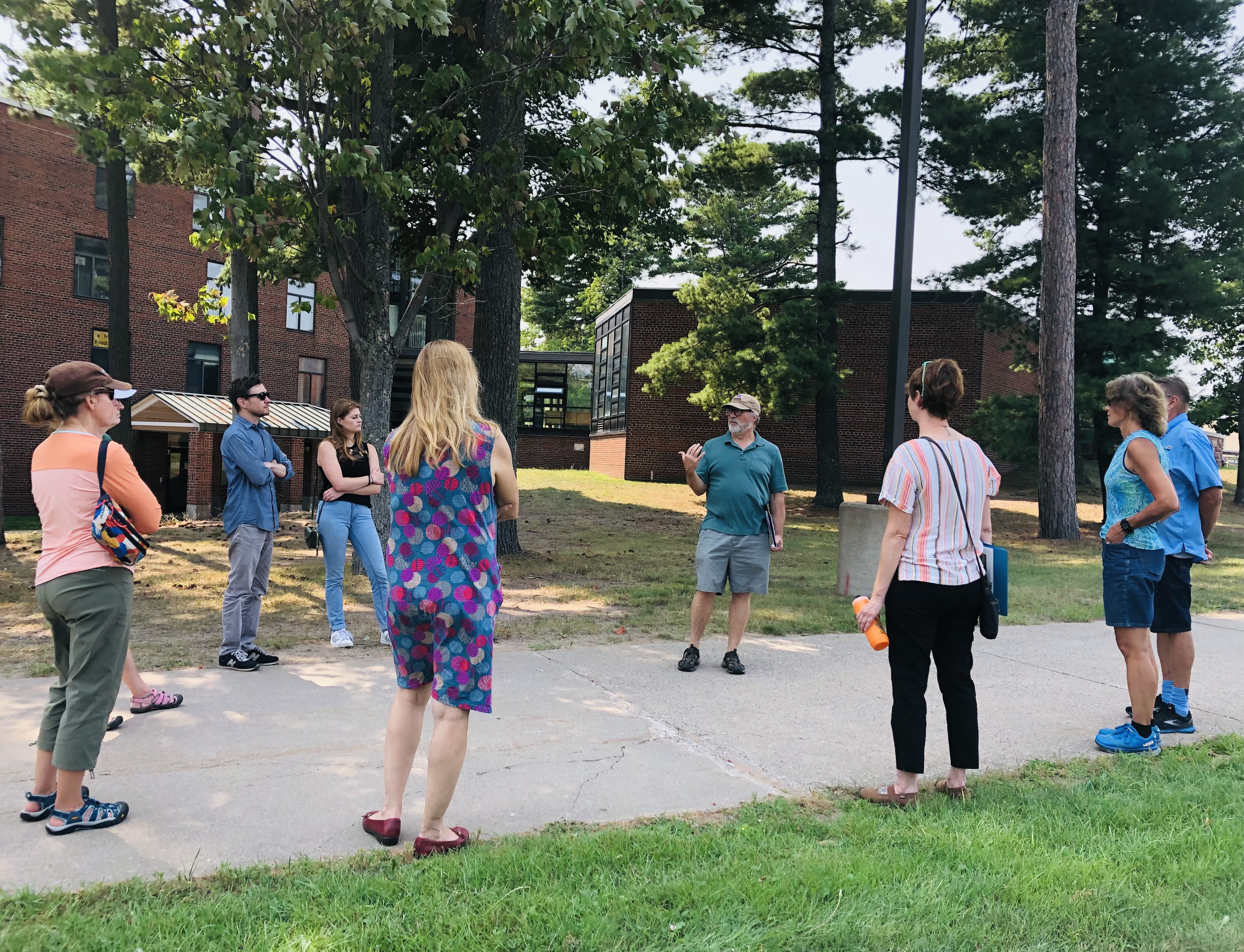 Truckey (center) leading an architectural walking tour. Two more will be offered Sept. 9 and 23.