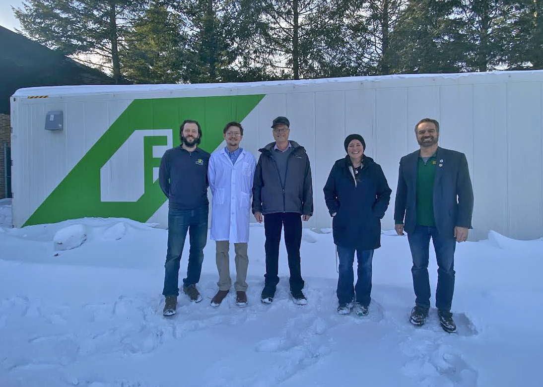 From left: Lucas, Boyer, McDowell, Henderson and NMU Vice President of Extended Learning and Community Engagement Steve VandenAvond in front of the Freight Farms shipping container laboratory, which was supported in part by a $100,000 grant from the Michigan Department of Agriculture and Rural Development's Rural Development Fund. (Dave Nyberg photo)