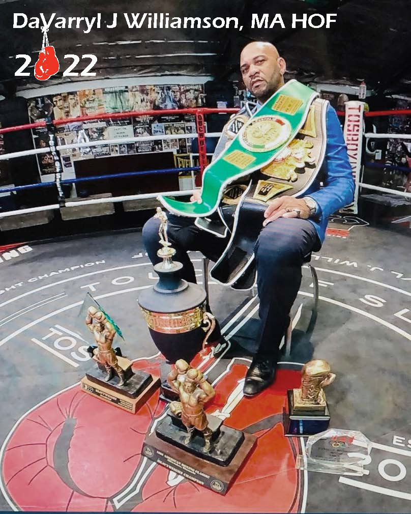 Williamson with belts and trophies in his TOS Boxing Gym