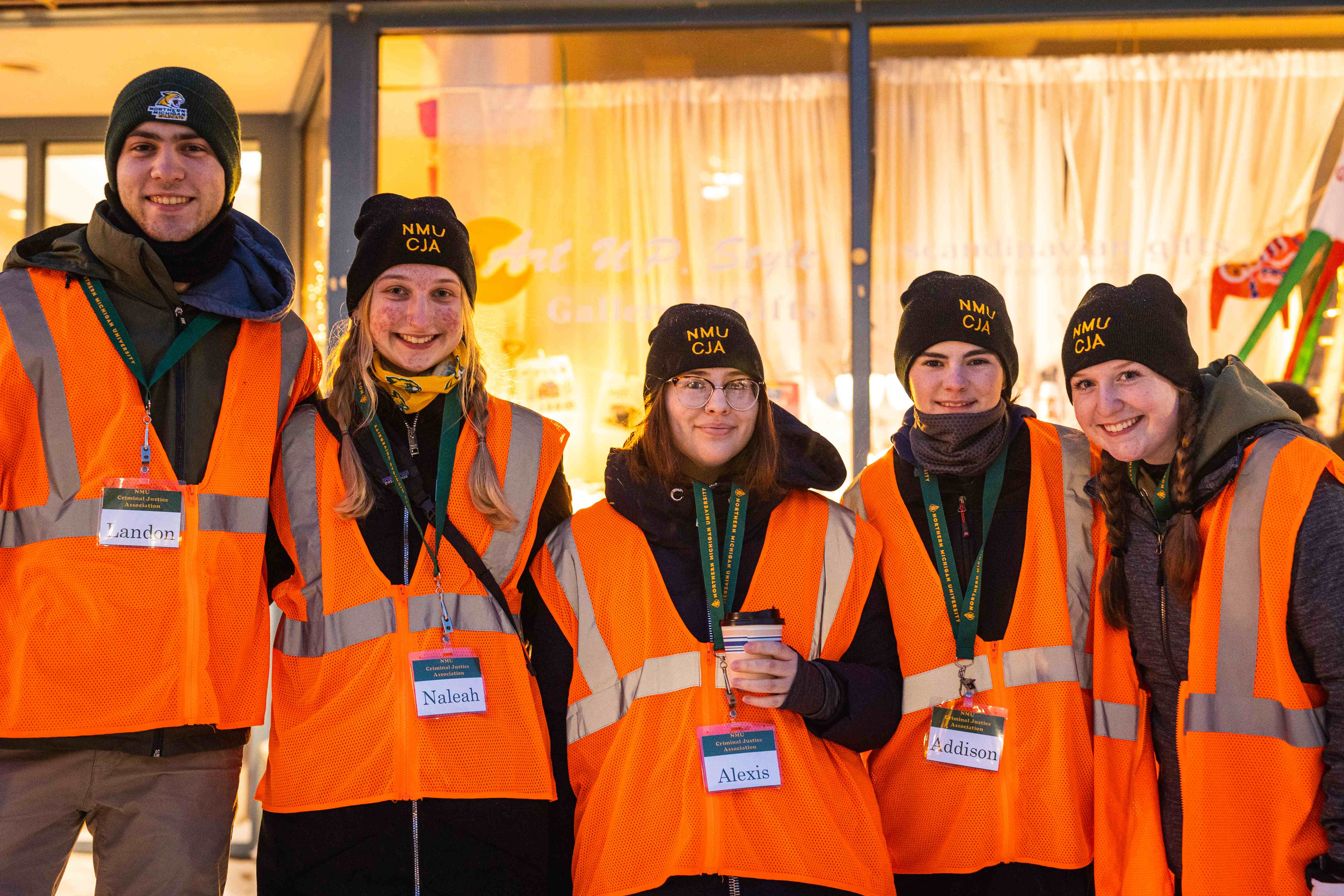 The NMU Criminal Justice Association (pictured at the 2022 races) is one of several student organizations that volunteer at the event