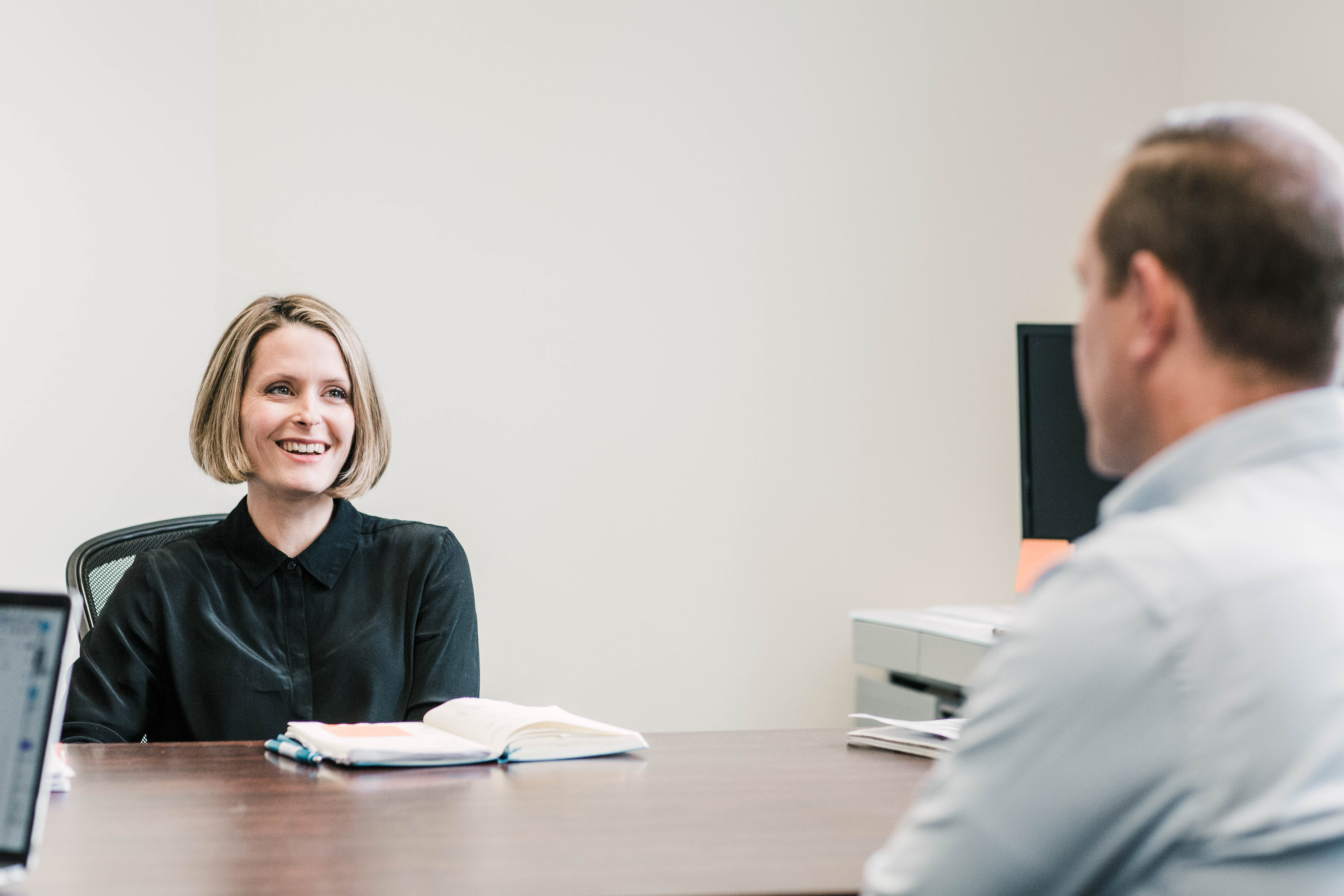 Tessman in a meeting at Montana Free Press