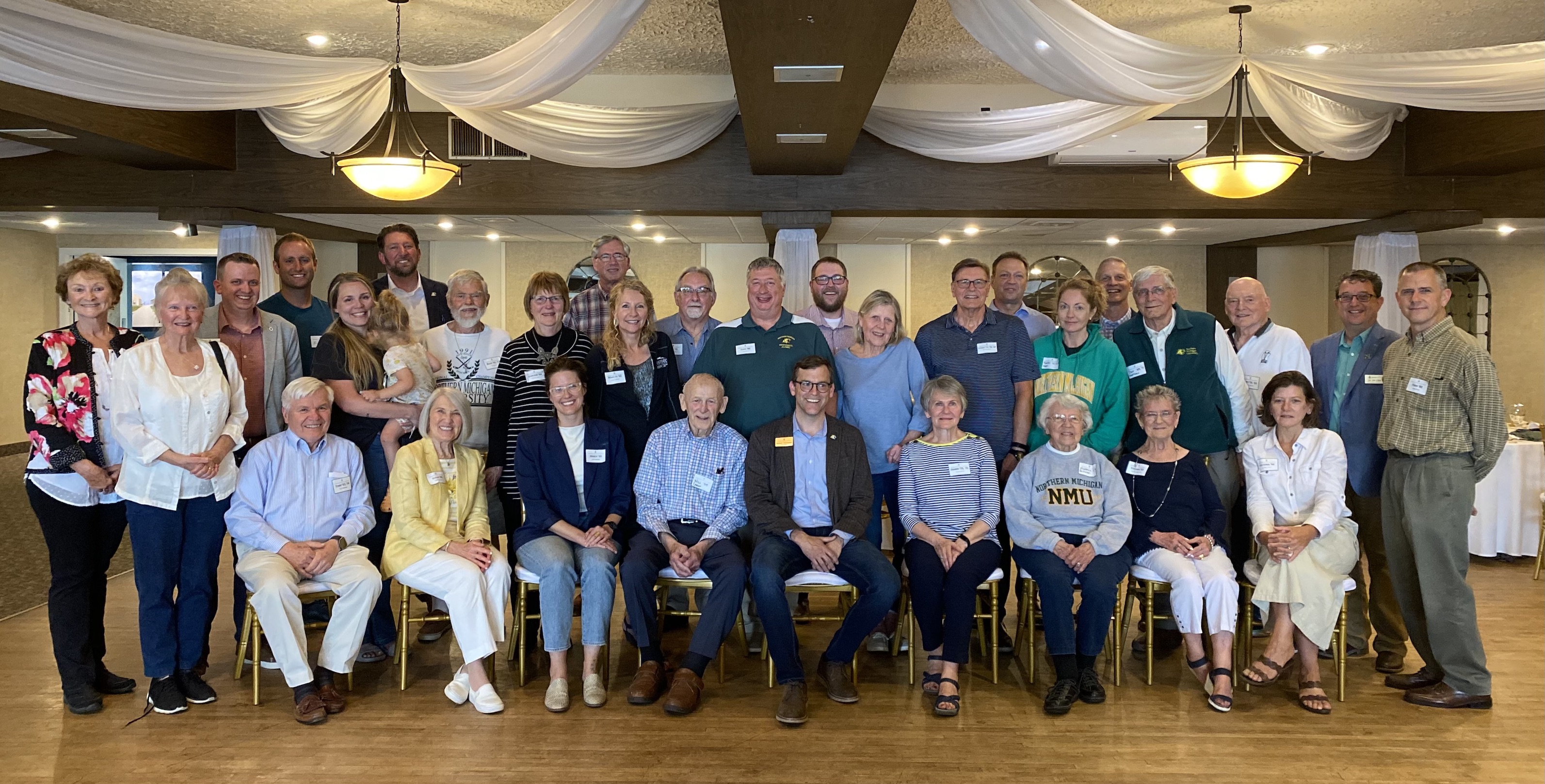 Tessman (front center) at a previous event in Escanaba