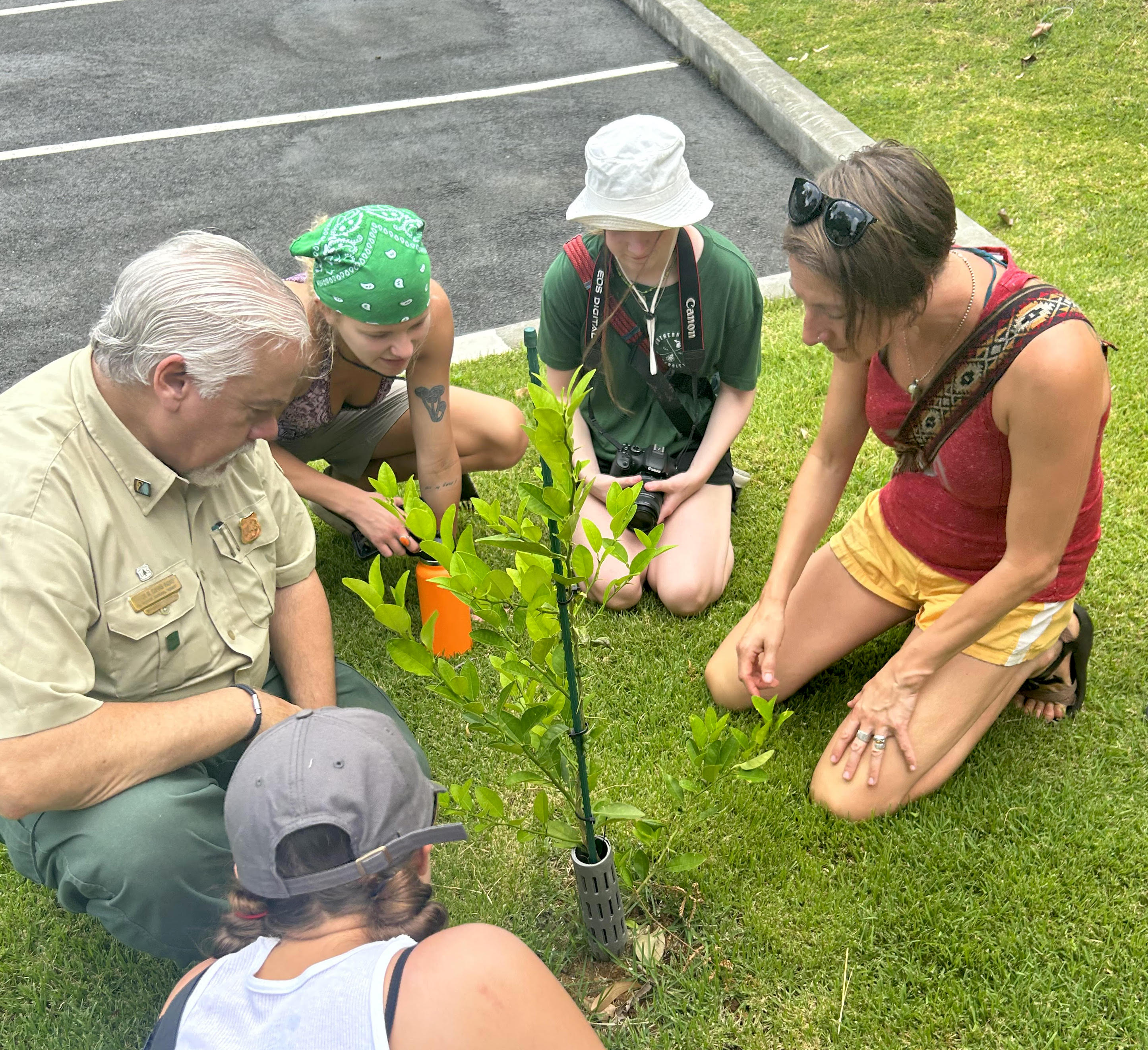 A community member interacts with the group