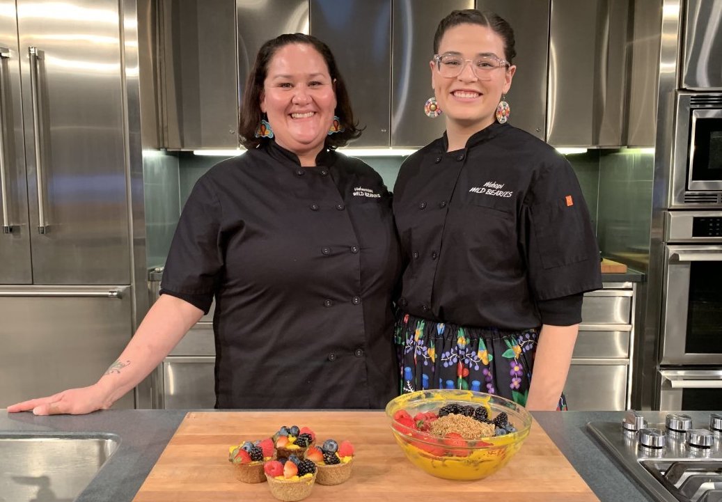 Fess (right) with her mom, Elena Terry, after showcasing Seedy SassSquash, a signature family dish, during the Smithsonian’s “Cooking Up History” demo (photo by Gabriel Pietrorazio for CivilEats.com).