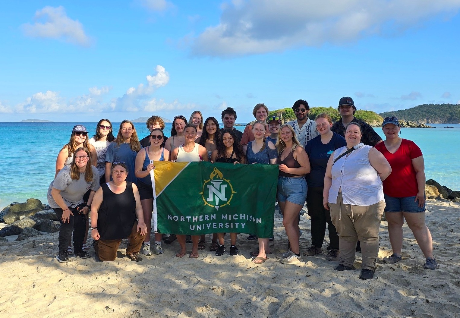 Group photo on the St. John shoreline