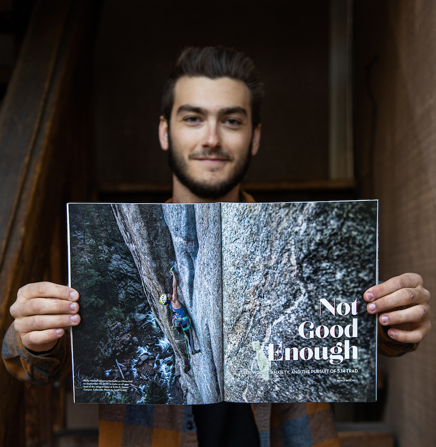 Scott Crady holds a magazine featuring one of his photos.