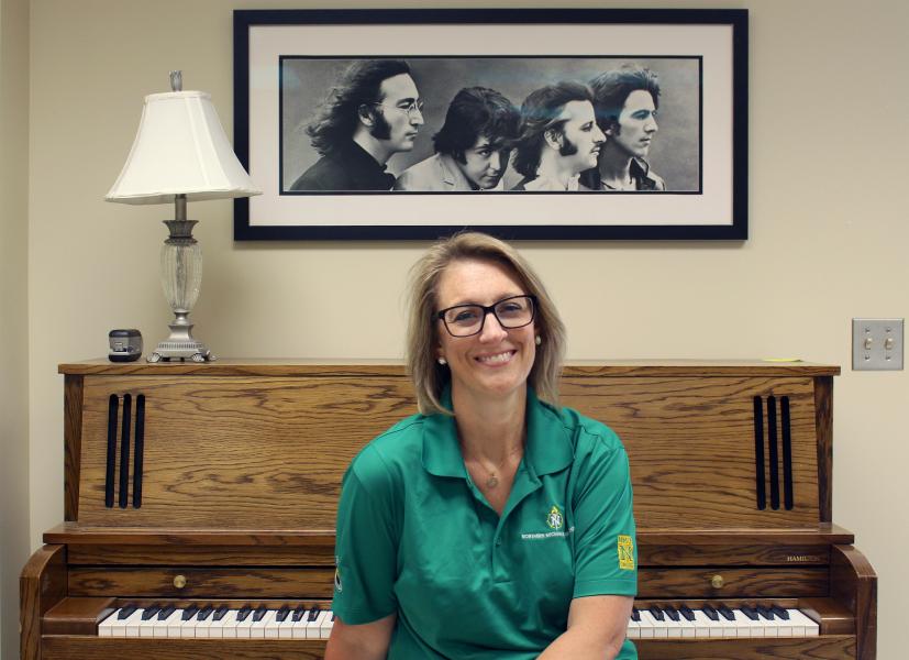 Colwitz with a Beatles poster backdrop