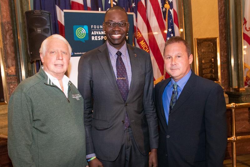 From left: NMU Trustee James Haveman, Lt. Gov. Garlin Gilchrist and NMU alumnus Brian Swift at the Impaired Driving Prevention Month Award Ceremony