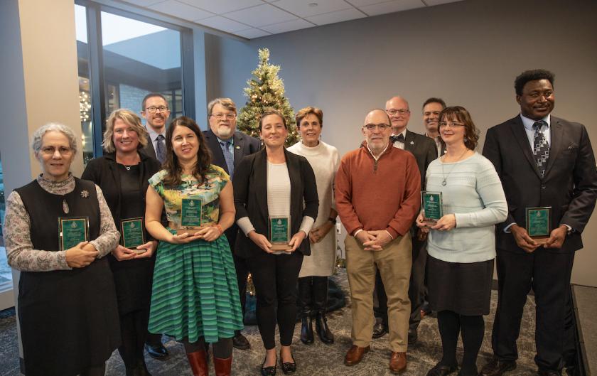 From left: Gold, Cameron-Standerford, Marquardson, McFawn, Technology and Occupational Sciences Dean Bob Eslinger, Glendening, Provost Kerri Schuiling, President Fritz Erickson, College of Arts and Sciences Dean Rob Winn, Vice President for Extended Learning and Community Engagement Steve VandenAvond, Ulland and Essila.