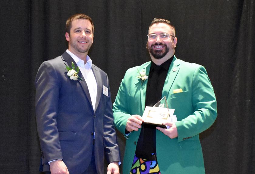 Digneit (right) with his award