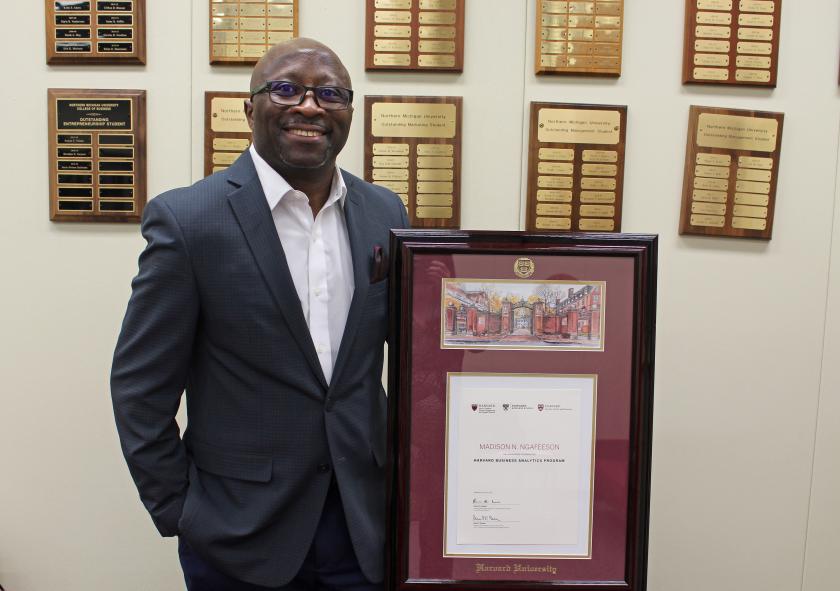 Ngafeeson with his Harvard certificate of completion