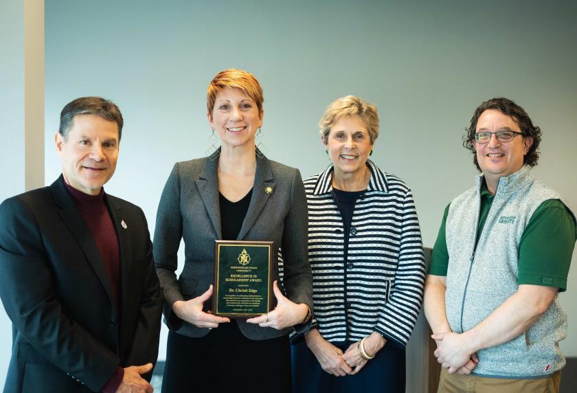 (from left): Interim Provost Dale Kapla, Christi Edge, Interim President Kerri Schuiling and Joe Lubig, associate dean and director of Education, Leadership and Public Service.