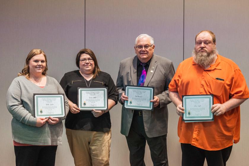 (from left) Attending team members Loehr, Belles, Hanson and Eagle