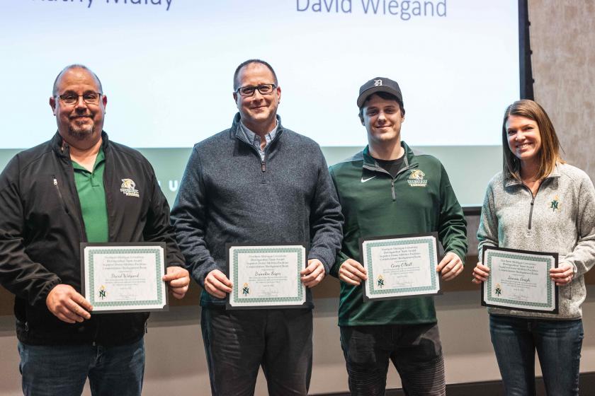 Team members Weigand, Sager, O'Neill and Emigh