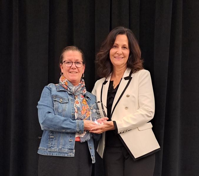 Rochester (left) with Jeri Beggs, FAR at Illinois State, who presented the award.