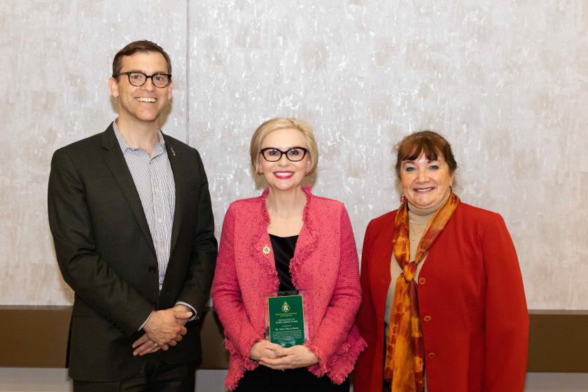 Boyer-Davis (middle) with President Brock Tessman and College of Business Dean Carol Johnson