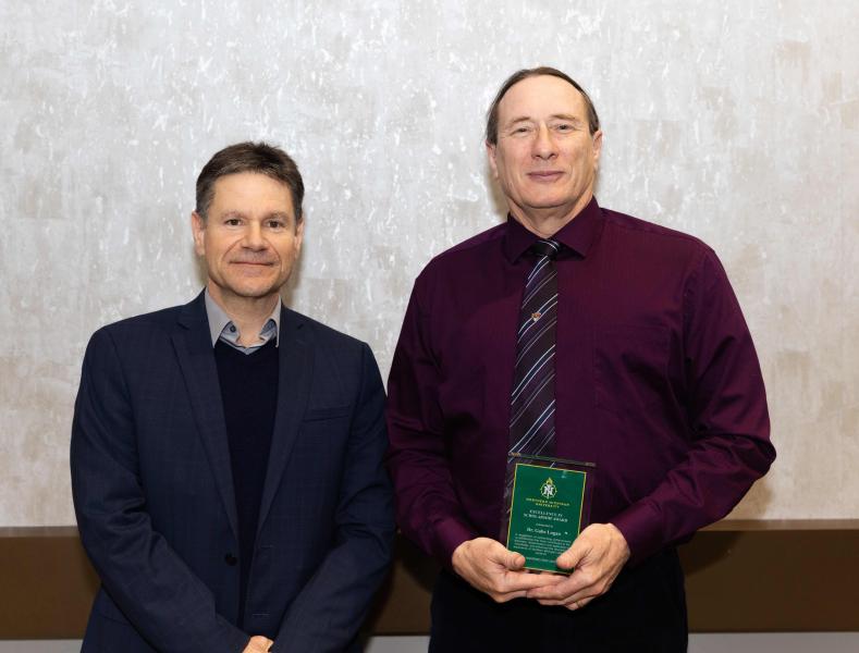 Logan (right) with Interim Provost Dale Kapla