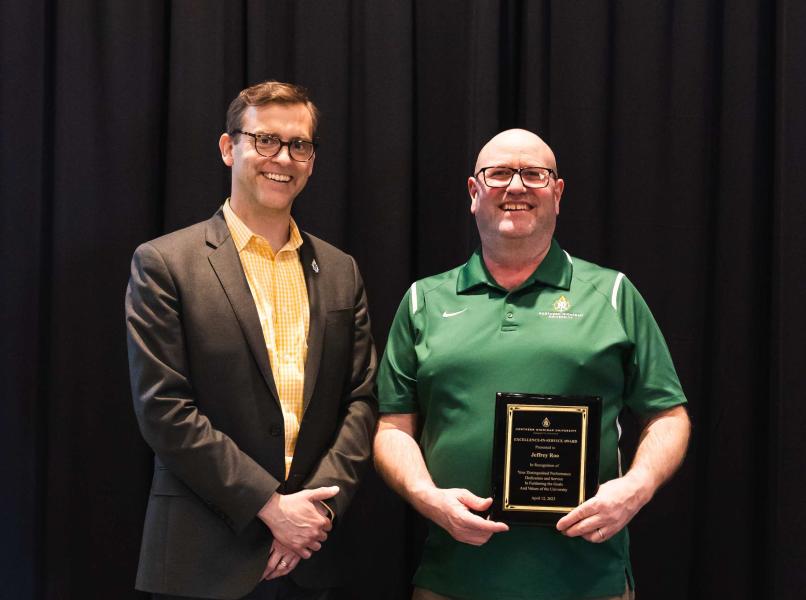 Roo (right) with President Brock Tessman