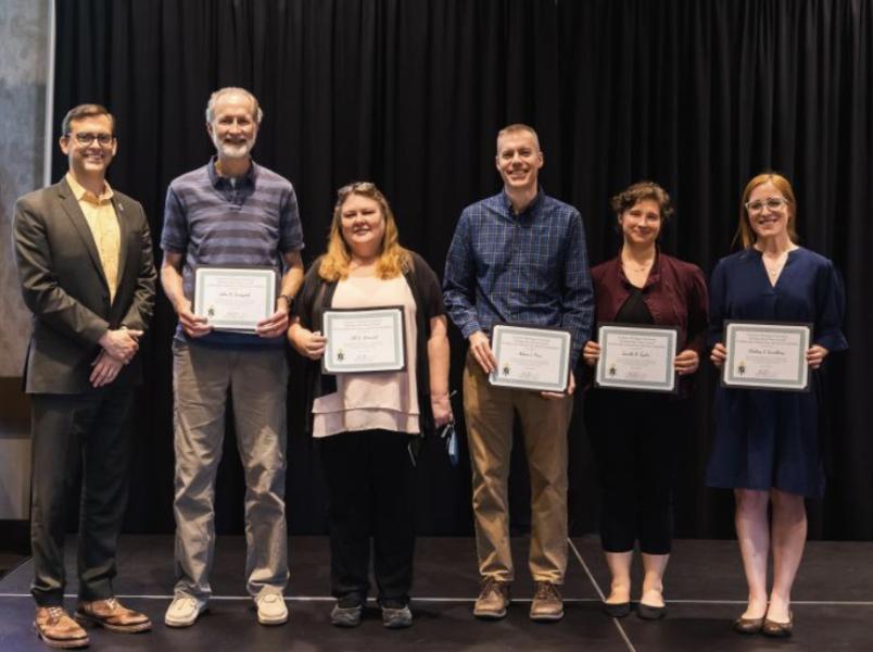 (From left) President Tessmen, John Bruggink and Jill Leonard-Biology, Adam Prus-Psychological Science, Janelle Taylor and Chelsey Sundberg-Grad Studies & Research. Not pictured:  Mlado Ivanovic-Philosophy, Amber LaCrosse-Psychological Science, Kim Larson-IACUC Team Member, Erich Ottem-Biology, Tesse Sayen-College of Graduate Studies & Research, Daniel Rowe-Mathematics & Computer Science, Dawn Sheffield-IACUC Team Member