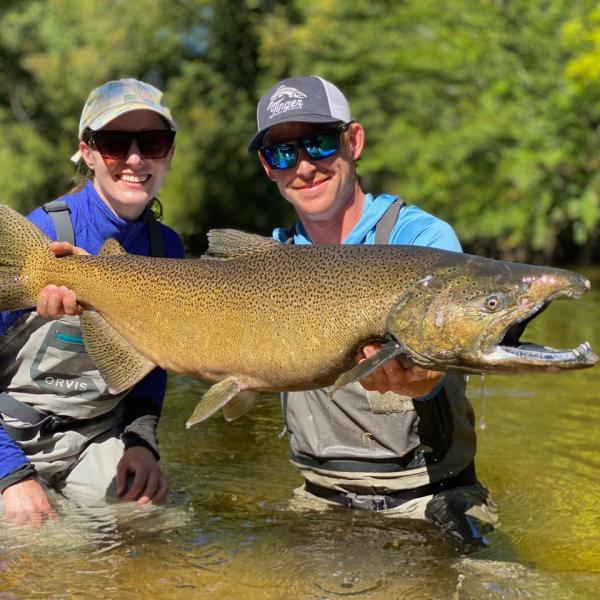 Ermatinger (right) with a client and her catch.