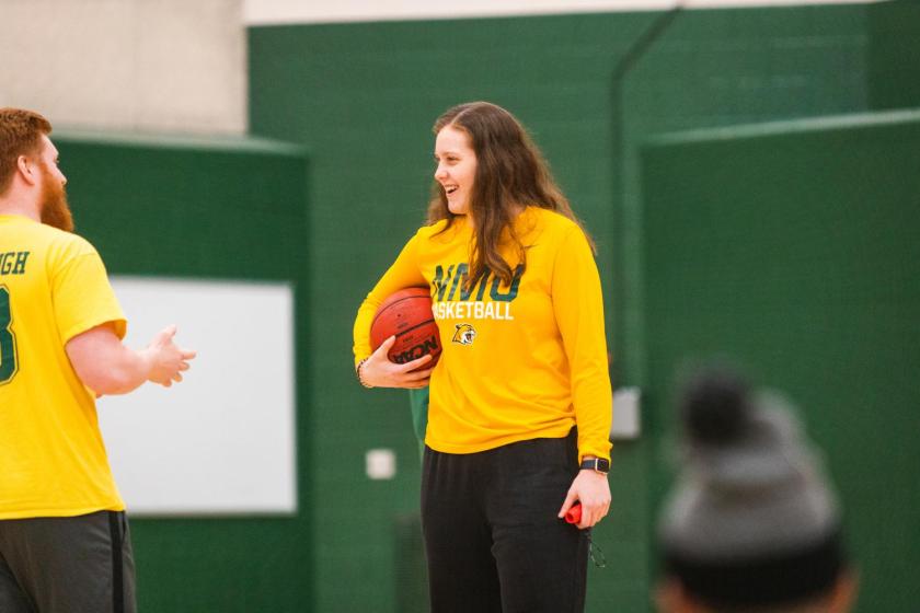 Student with a basketball