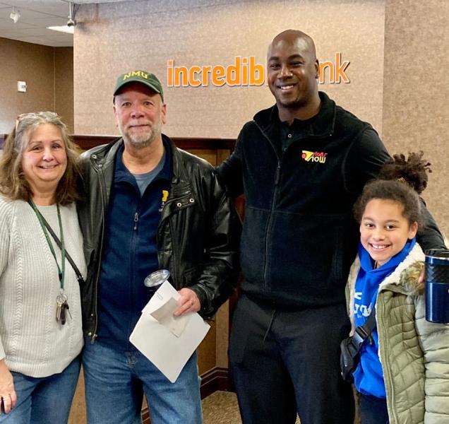 (From left): Lenette and Mark Pynnonen with Keven Hagans and his daughter