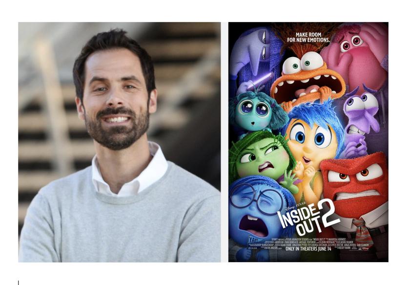 Mann alongside the 'Inside Out 2' poster