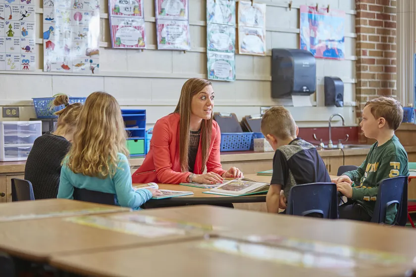 Early education teacher with students (NMU stock photo)
