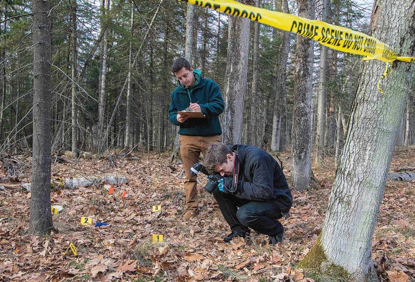 Students gaining crime scene photography experience (NMU file photo)