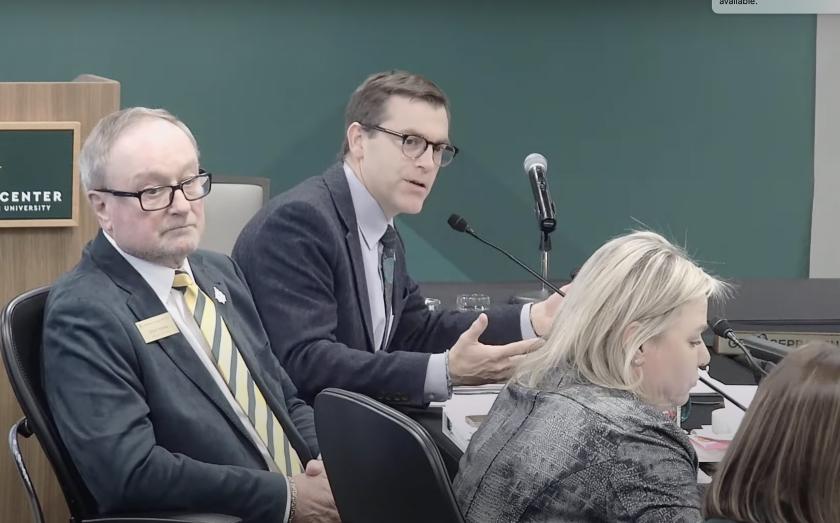 NMU President Brock Tessman (center) at the board meeting with Chair Steve Young and Vice Chair Alexis Hart
