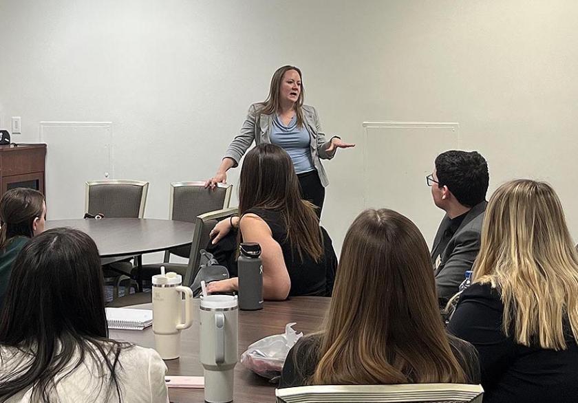 Hetrick (standing) meets with business students from Kent State University (B&W Enterprises LinkedIn photo)