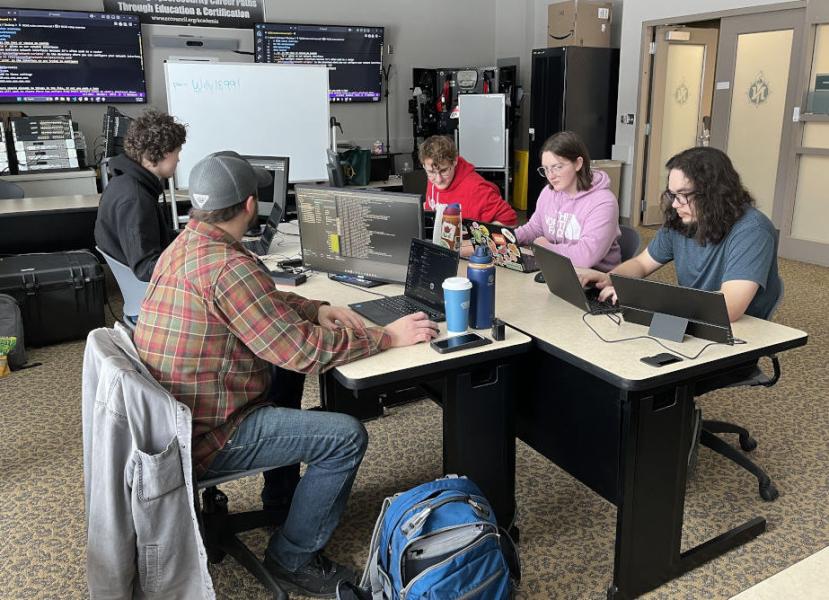 The NMU team at work in the Northern Center cyber lab.