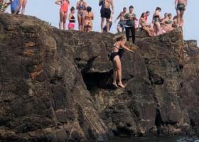 Image of Shawn Robinson-Sobczak jumping off Black Rocks to save someone