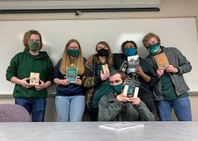Lippert (front) with his NMU teammates (from left) Brett Mattson, Ella Uren, Mackenzie Pierson, Deleena Simon and Andrew Semak