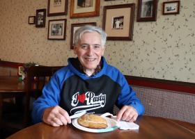 Magnaghi lunching on an iconic pasty at Lawry's in Marquette