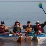 Four kayakers in their kayaks