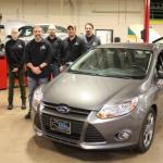 NMU students and faculty with the Ford Focus