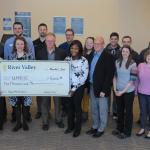 Pictured (from left) are: River Valley Bank representatives Jeff Prophet, Mike Mattila, Ashley Cody, Jake Trucco and Lea Dziesinski; Shane Kentala of UPHS; Paul Mann of NMU; Greg Lahti and Dr. Sonia Geschwindt of UPHS Neurosurgery; NMU reps Megan Altekruse, Rob Winn, Joe Duffy, Amber LaCrosse, and Dan Raymond; Joy Osti of UPHS; Nick Shortreed of NMU; and Emily Wright of UPHS.