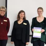 From left: Lisa Eckert and Janelle Taylor of Graduate Education and Research with winner Hernstrom-Hill.