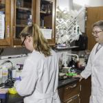 Sharp (right) in his lab with former NMU Lundin Honors Summer Research Fellow Maggie Bohm.