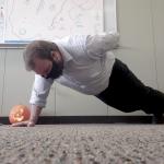 UAW Local 2178 member and challenge participant Ben Chaney does a pushup in his office.