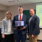 Smith (center) after successfully completing the NMU EdS pathway into the Central Michigan University EdD program in February 2020