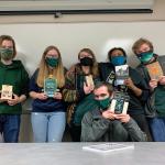 Lippert (front) with his NMU teammates (from left) Brett Mattson, Ella Uren, Mackenzie Pierson, Deleena Simon and Andrew Semak