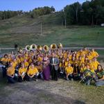 Grugin (front center with his wife, Betsy) and NMU band members at the awards event.