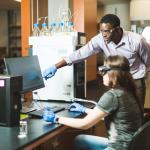 NMU faculty member and students in a medicinal plant chemistry lab.