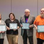 (from left) Attending team members Loehr, Belles, Hanson and Eagle