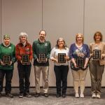 Excellence in Service Award winners (from left) Hegmegee, Ross, Sproull, Laxo, Mankee, Demboski, Thurston and Hamel