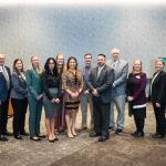 (From left): Trustee Jason Morgan, Chair Steve Young, Trustees Lisa Fittante and Missie Holmquist, BOT award winners Chavez-Rhoades, Gage, Line, Lippert and Goss, Trustees Greg Seppanen and Tami Seavoy, Vice Chair Alexis Hart and Trustee Robert Mahaney