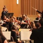 Rhyneer leading the NMU Orchestra